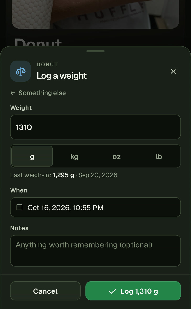 Donut's Log a weight sheet on a phone: 1310 typed in the box, g picked in the unit buttons under it, the line Last weigh-in: 1,295 g · Sep 20, 2026, When, and the button Log 1,310 g.